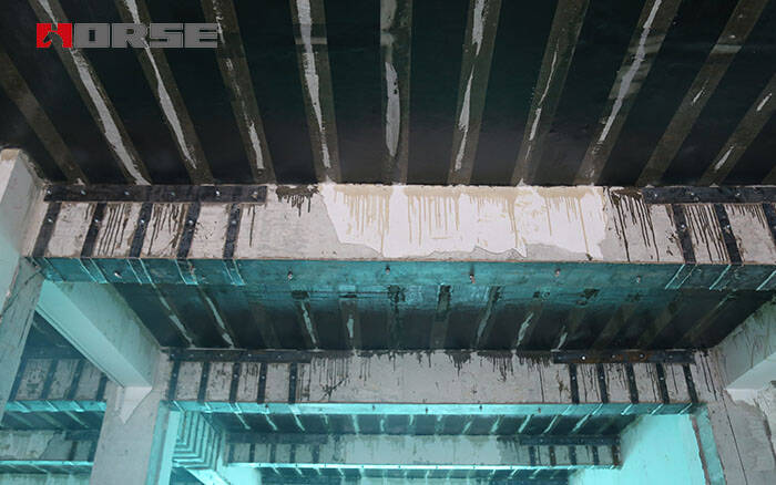 FRP COMPOSITE STRENGTHENING WITH UNIDIRECTIONAL CARBON FIBER FRP COMPOSITE STRENGTHENING WITH UNIDIRECTIONAL CARBON FIBER