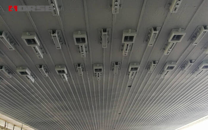 Pre-stressed CFRP strip Pre-stressed CFRP strip