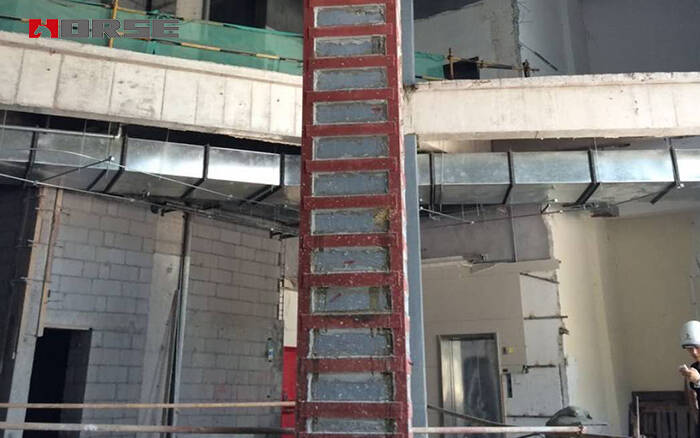 Reinforced concrete columns are wrapped with steel Reinforced concrete columns are wrapped with steel