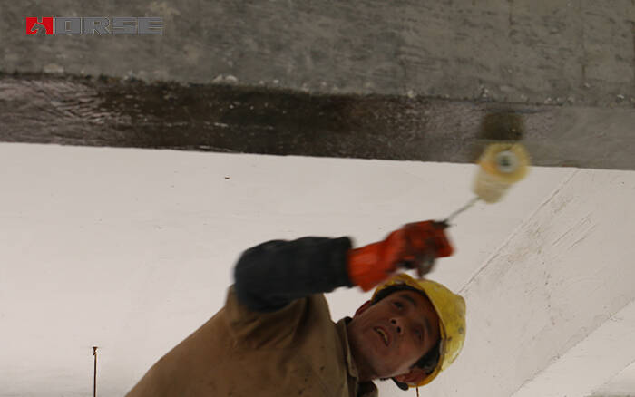 apply carbon fiber adhesive on concrete beam apply carbon fiber adhesive on concrete beam