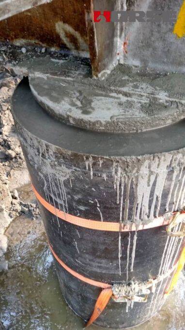 Rehabilitation of a Reinforced Concrete Jetty wIth CFRP Jacketing Rehabilitation of a Reinforced Concrete Jetty wIth CFRP Jacketing