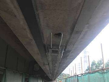 HM Prestressed CFRP laminate strengthening the concrete bridge