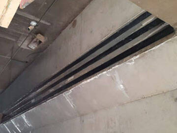 Repair and Strengthening of Bridges with High Strength CFRP strips